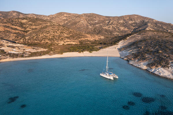 Aerial view of Ano Myrsini Bay in Polyaigos Island, near Milos and Kimolos Island (Cyclades Islands, Greece, Europe)