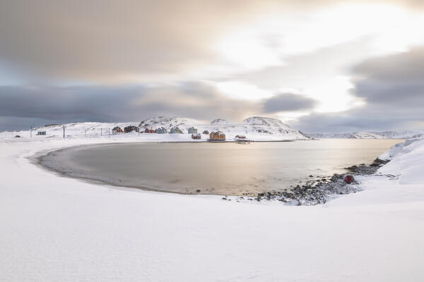 The village of Veines covered in snow on a cold winter morning (Kongsfjord, Varanger Peninsula, Troms og Finnmark, Norway)