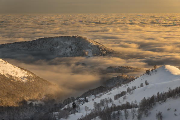 Winter view from Bielmonte with sea clouds during sunset (Bielmonte, Veglio, Biella province, Piedmont, Italy, Europe)
