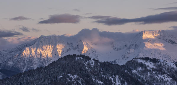 Winter view of the Val Grande mountains from the Pietro Crosta hut during sunset
(Alp Solcio, Varzo, Verbano Cusio Ossola province, Piedmont, Italy, Europe)