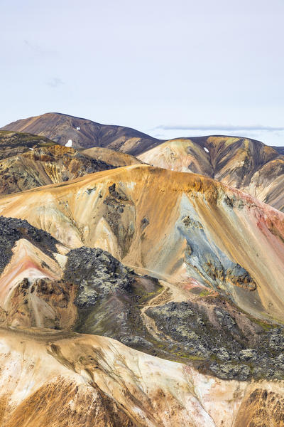 A view of Landmannalaugar and Brennisteinsalda mountain from Blahnukur mountain (Landmannalaugar, Fjallabak Nature Reserve, Highlands, Southern Region, Iceland, Europe)