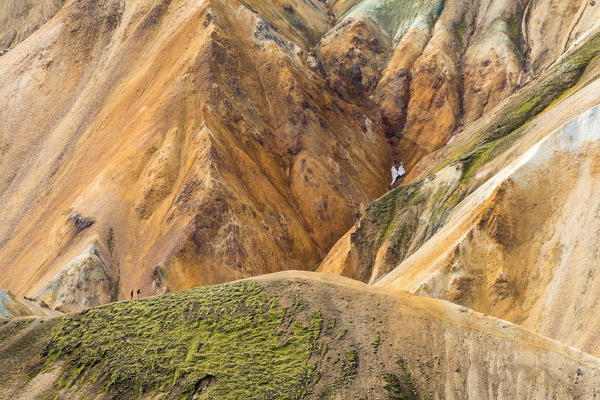 Trekkers are walking in Landmannalaugar (Fjallabak Nature Reserve, Highlands, Southern Region, Iceland, Europe)