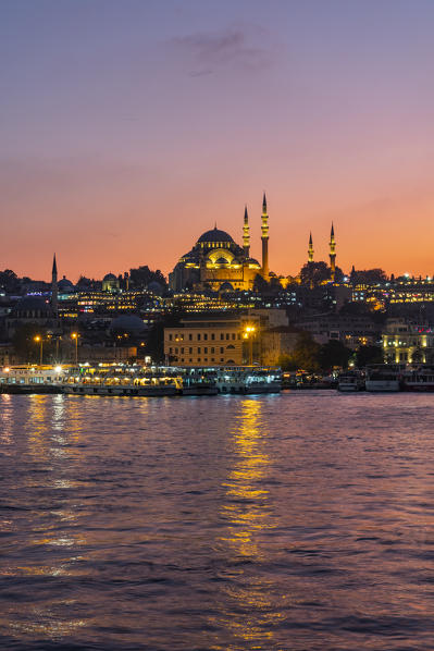 Cityscape of Golden Horn at sunset from Galata Bridge. Istanbul, Turkey