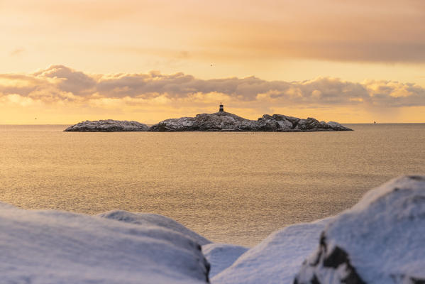 The lighthouse of Reine from the opposite side of the bay. Reine, Lofoten island, Norway, Scandinavia, Europe.