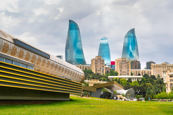 Cityscape from Baki Bulvari with Flame Towers in the background. Baku, Azerbaijan, Central Asia.
