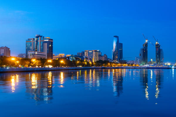 Cityscape of Baku skyline at twilight from Caspian seafront. Baku, Azerbaijan, Central Asia.