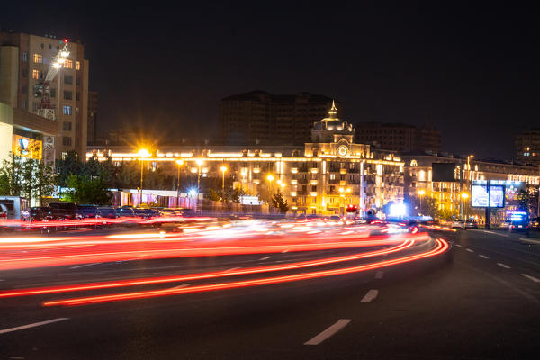 Nightscape with lights in the city center during evening. Baku, Azerbaijan, Central Asia.