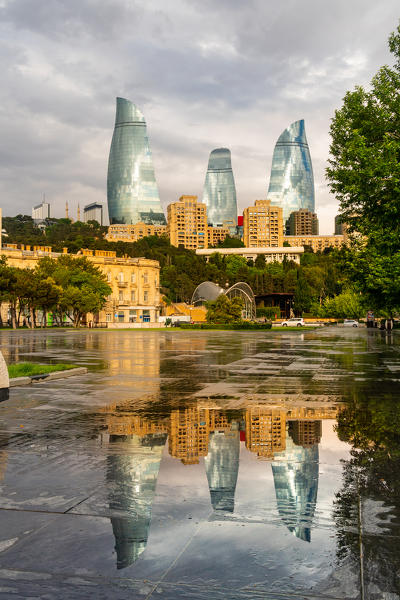 Flame towers in the background from Baki Bulvari park. Baku, Azerbaijan, Central Asia.