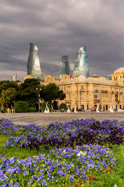 Flame towers and flowerbeds in the Baki Bulvari area. Baku, Azerbaijan, Central Asia.