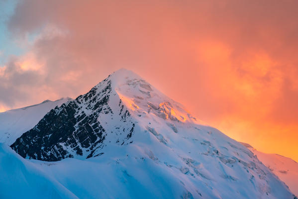 6000 meters peak at sunset from Peak Lenin camp one. Pamir, Kyrgyzstan, Central Asia. 