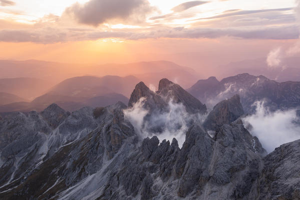 Sunsetscape over Catinaccio peaks during summer over mountains. Fassa valley, Trento district, Dolomites, Trentino Alto Adige, Italy, Europe.