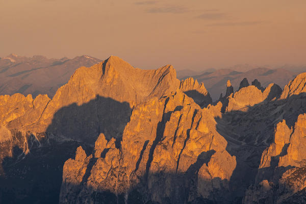 Catinaccio Rosengarten at sunrise in a elevated view. Canazei, Contrin valley, Fassa valley, Trento district, Dolomites, Trentino Alto Adige, Italy, Europe.