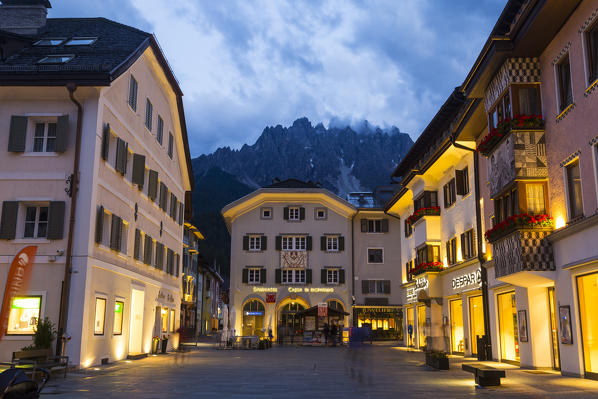The mountain village of San Candido during twilight. San Candido, Pusteria valley, Bolzano district, Dolomites, Trentino Alto Adige, Italy, Europe. 