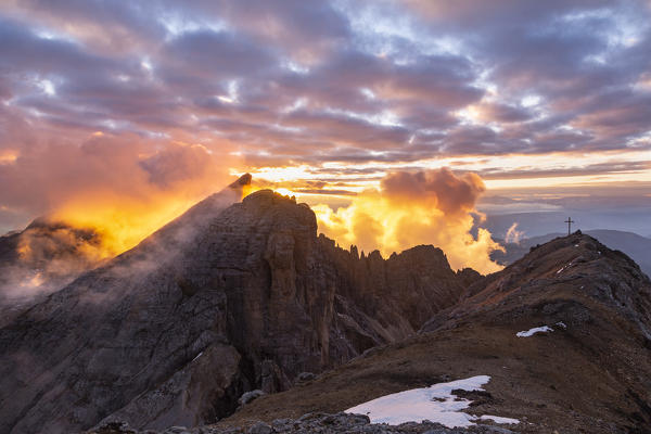 Sunsetscape of Dolomites mountains with Cimon del Latemar peak from Schenon mount . Costalunga pass, Fassa valley, Pozza di Fassa, Trento district, Dolomites, Italy, Europe.