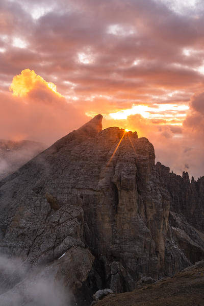 Cimon del Latemar peak from Schenon mount during a summer sunset. Costalunga pass, Fassa valley, Pozza di Fassa, Trento district, Dolomites, Italy, Europe.