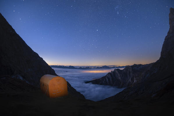 Nightscape of Dolomites mountains from Rigatti bivac in Latemar group. Costalunga pass, Fassa valley, Pozza di Fassa, Trento district, Dolomites, Italy, Europe.