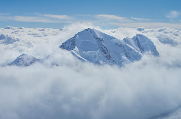 The summit of Lyskamm mount from Capanna Regina Margherita in Rosa mount at sunrise. Gressoney, Aosta district, Valle d'Aosta, Alps, Italy, Europe.