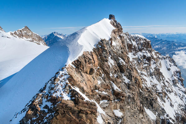 The Europe highest alpine refuge of Capanna Regina Margherita in Rosa mount from an aerial view. Gressoney, Aosta district, Valle d'Aosta, Alps, Italy, Europe.