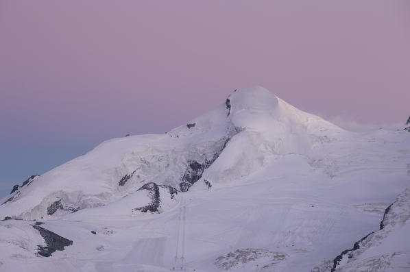 Allalinhorn at sunset in Zermatt valley. Sass Fe, Vallese canton, Switzerland, Alps, Europe. 