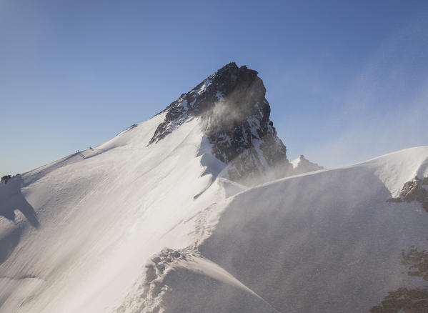 Nadelhorn peak and the snow ridge from Stecknadelhorn. Sass Fe, Vallese canton, Switzerland, Alps, Europe.