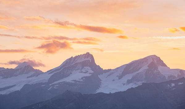 Rimpfischhorn and Strahlhorn peaks over Zermatt valley at sunrise from Theodulo glacier near Gandegghutte. Zermatt, Vallese canton, Switzerland, Alps, Europe.