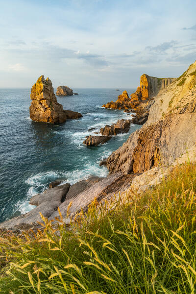 Sunsetscape of Playa del Portio in the Cantabrian sea. Costa Quebrada, Liencres, Cantabria, Spain, Europe.
