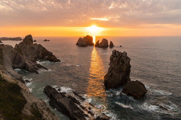 Seascape of Urro major and Urro Minor at sunset in the cantabrian sea of Playa del Portio. Costa Quebrada, Liencres, Cantabria, Spain, Europe.