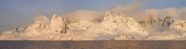 Sunset panorama in a fjord of Arctic sea in West Coast of Greenland, Artic Sea, Denmark