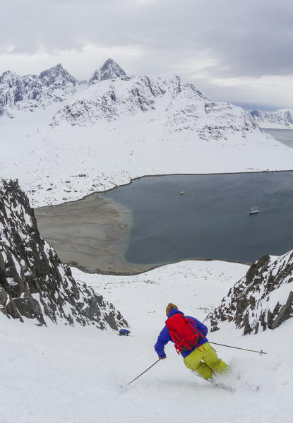 Ski mountaneering on the mountains of Greenland, Artic sea, Denmark