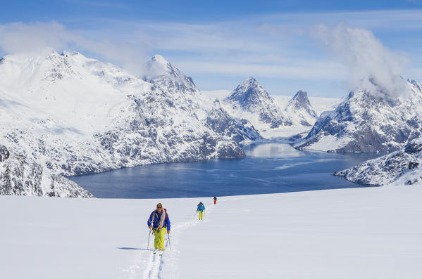 Ski touring in the fjords and landscapes of the Arctic sea in Greenland, Artic sea, Denmark