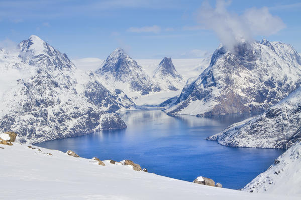 Artic landscape between fjords and snowed mountains in West Coast of Greenland, Artic sea, Denmark