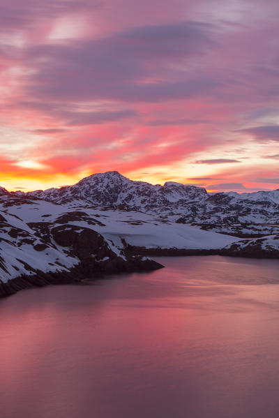 Arctic sea sunset with red clouds in the sky. Maniitsoq, Greenland, Artic sea, Denmark