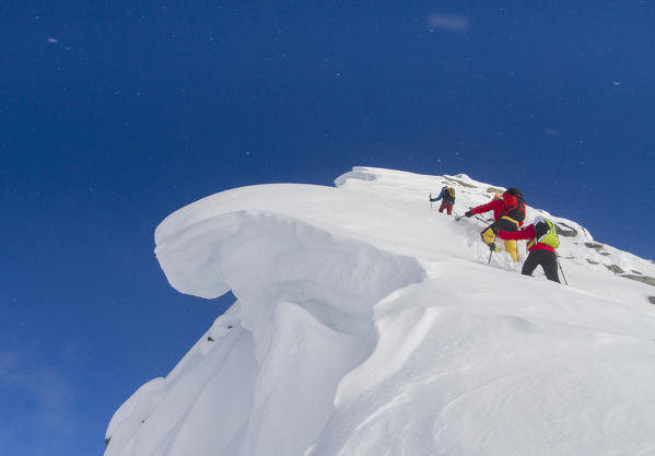 Winter alpinists at Roger pass, British Columbia, Canada