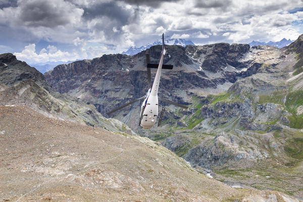 Helicopter dive. Valmalenco, Valtellina, Lombardy, Italy, Europe.