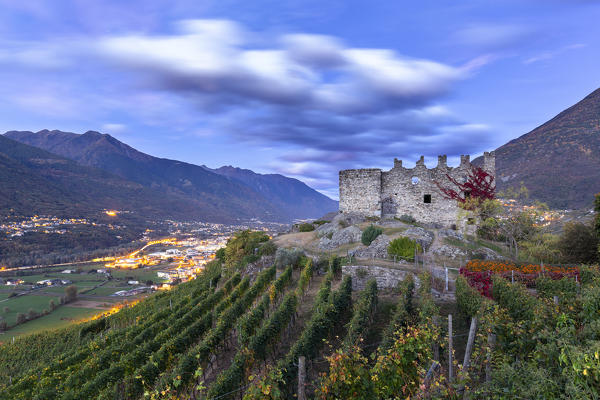 Grumello castle at dusk. Sondrio, Valtellina, Lombardy, Italy, Europe.