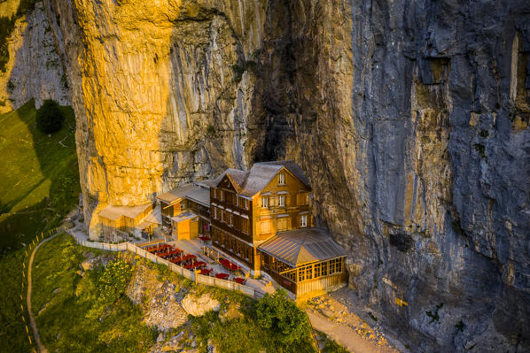 Aerial view of Berggasthaus Aescher at sunrise, Canton of Appenzell, Alpstein, Switzerland, Europe
