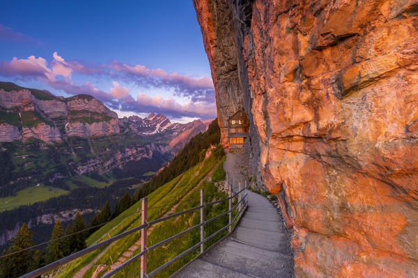 Red light of sunrise at Berggasthaus Aescher, Canton of Appenzell, Alpstein, Switzerland, Europe