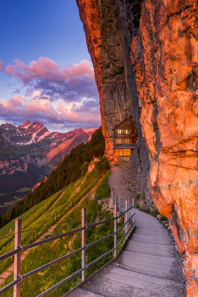 Red light of sunrise at Berggasthaus Aescher, Canton of Appenzell, Alpstein, Switzerland, Europe