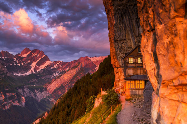 Red light of sunrise at Berggasthaus Aescher, Canton of Appenzell, Alpstein, Switzerland, Europe