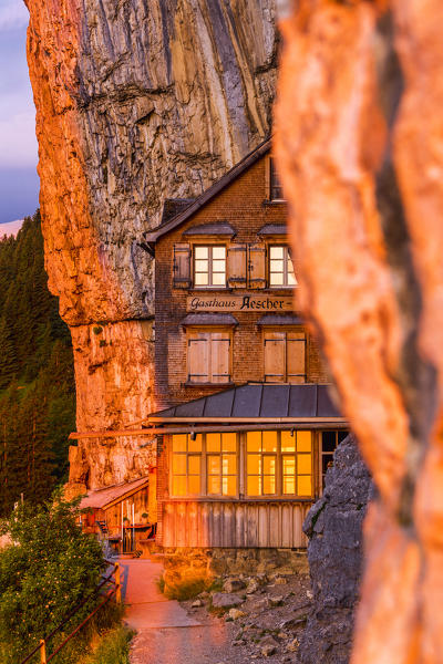 Red light of sunrise at Berggasthaus Aescher, Canton of Appenzell, Alpstein, Switzerland, Europe