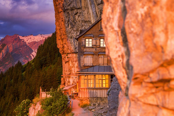 Red light of sunrise at Berggasthaus Aescher, Canton of Appenzell, Alpstein, Switzerland, Europe