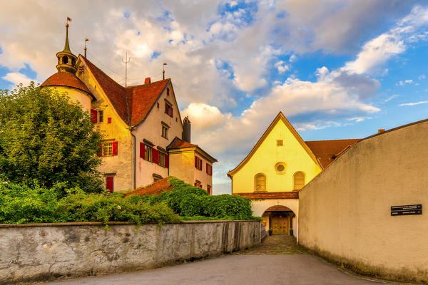 Old house and church illuminates by sunset colors, Appenzell, Canton of Appenzell, Alpstein, Switzerland, Europe