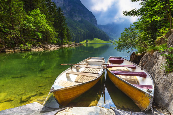 Moored boats at Seealpsee, Canton of Appenzell, Alpstein, Switzerland, Europe