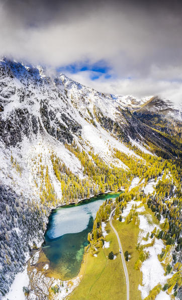 Aerial view of Palpuognasee after a autumnal snowfall.  Palpuognasee, Canton of Graubunden, Switzerland.