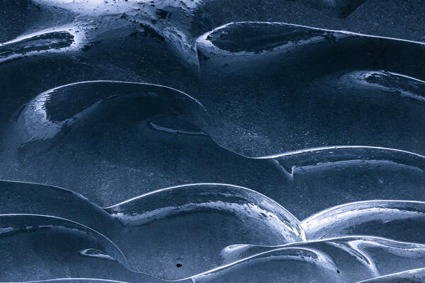 Detail of the ice inside an ice cave in the Morteratsch Glacier. Engadine Valley, Graubunden Canton, Switzerland, Europe