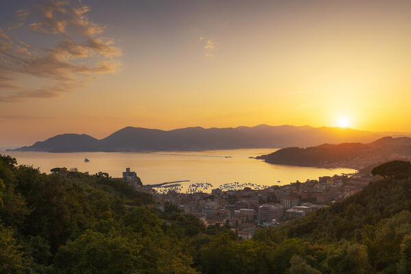 Elevated view of the village of Lerici during sunset. View of the Cinque Terre Park in the background. Lerici, Gulf of La Spezia, La Spezia province, Liguria, Italy, Europe