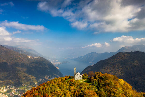 Aerial view of Hermitage of San Zeno(Eremo di San Zeno) in autumn with view on the Como lake. Intelvi valley, Lombardy, Italy, Europe.