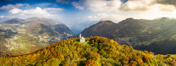 Aerial view of Hermitage of San Zeno(Eremo di San Zeno) in autumn with view on the Como lake. Intelvi valley, Lombardy, Italy, Europe.