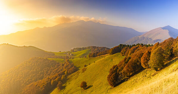 Autumn colors at sunset from Poncione di Cabbio peak, Valle Intelvi, Lombardy, Italy, Europe.