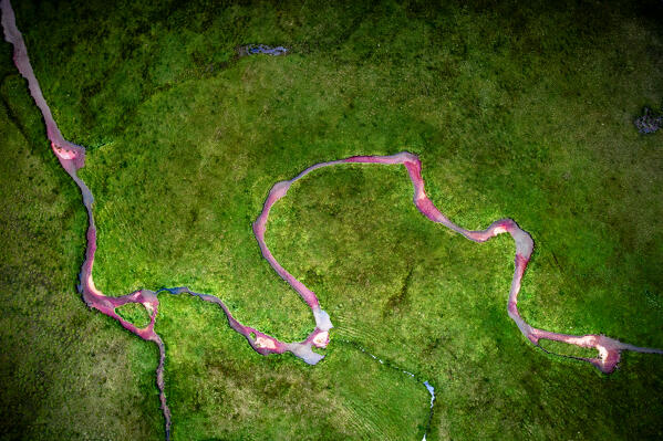 Aerial view of colorful river, Valmalenco, Valtellina, Lombardy, Italy, Europe.